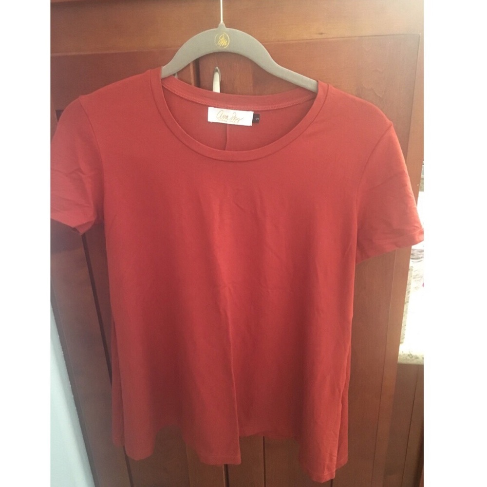 Cute dark orange blouse by Ava Sky.